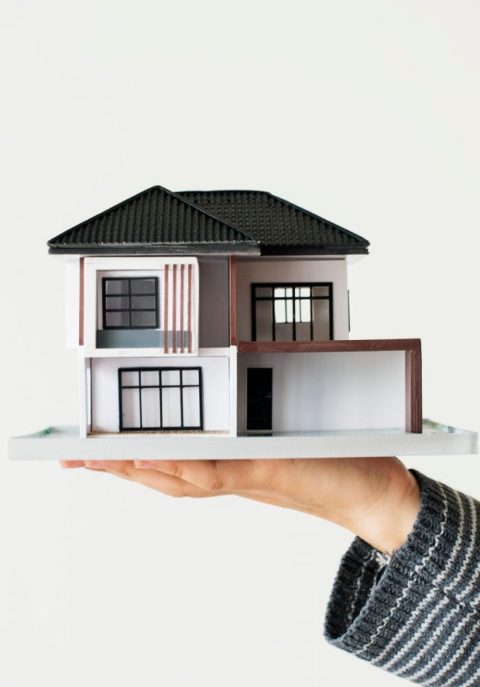 hand-presenting-model-house-home-loan-campaign (1)